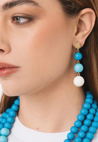 Orecchini pendenti a tre sfere in acrilico tono azzurro opaco Blu/bianco/oro