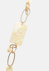 Collana lunga a catena con pietre rettangolari in acrilico gialle Oro/giallo