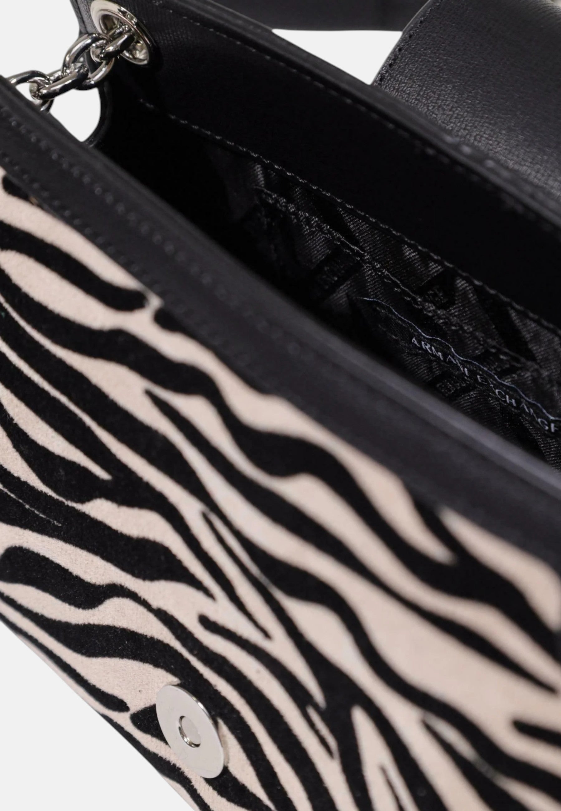 Mini borsa a tracolla/a spalla da donna con patta, forma trapezoidale e stampa zebrata. Black/script