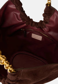 Coccinelle Borsa da donna in pelle scamosciata con logo in rilievo. Brunette