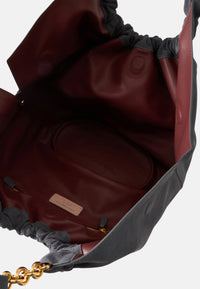 Coccinelle Borsa da donna in pelle scamosciata con logo in rilievo. Stove