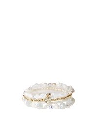 Bracciale elastico multi filo con pietre in vetro e conchiglie bianche Bianco